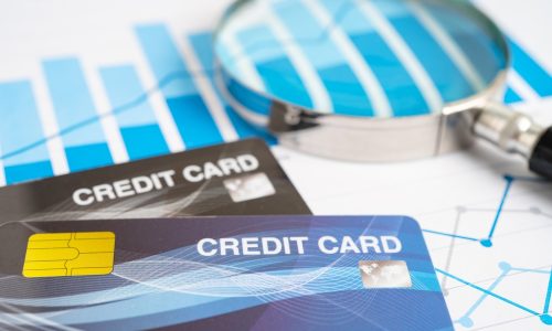 Credit,Card,Model,On,Chart,And,Graph,Spreadsheet,Paper.,Finance